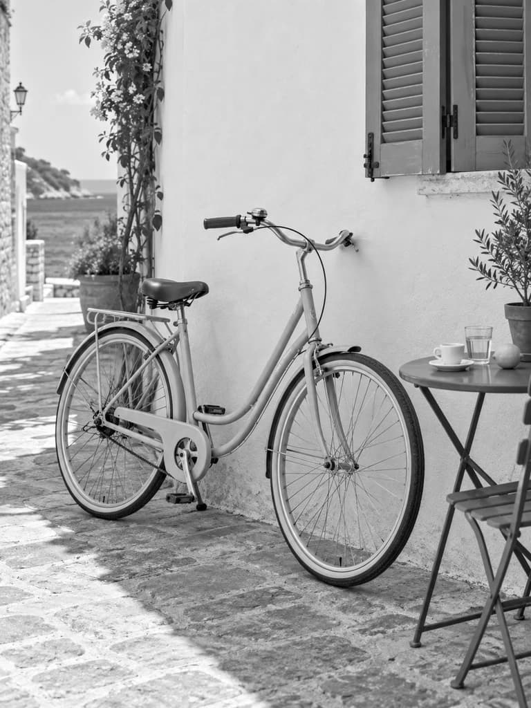 Original bicycle and espresso still life in black-and-white film tones with grain